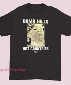 A graphic T-shirt featuring the Slap Magazine logo with an illustration of bomb hills and the words "Not" incorporated into the design, representing a skateboarding or streetwear style.