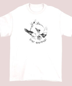 Light beige t-shirt featuring a cute, modest pelican illustration with the phrase 'Pelican Vibes Only' in playful font, perfect for a humorous and modest style
