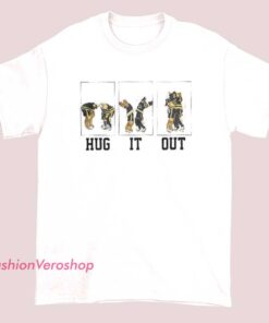 Cute T-shirt featuring a design of a Bruins goalie giving a hug, with playful text 'Hug It Out,' celebrating team spirit and camaraderie.