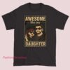 A classic graphic T-shirt with the phrase "Awesome Like My Daughter" displayed in bold, vintage-style lettering and simple design elements.