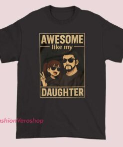 A classic graphic T-shirt with the phrase "Awesome Like My Daughter" displayed in bold, vintage-style lettering and simple design elements.