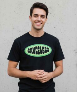 Amelia Dimoldenberg Merch Sauceless Shirt 7 Amelia Dimoldenberg Sauceless Shirt featuring bold graphic text inspired by Chicken Shop Date, funny UK YouTube host merch tee, unisex streetwear cotton t-shirt for fans of Amelia Dimoldenberg style.