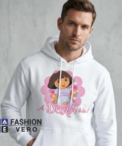 Sweet Pastel Pink Dora Cute Hoodie featuring adorable cartoon inspired artwork, pastel pink aesthetic, cute character design, playful fan fashion, and comfortable casual apparel.