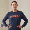 Oakley Classic Logo Navy Blue Sweatshirt featuring classic logo artwork, soft cotton fabric, navy blue styling, casual streetwear appeal, and versatile everyday fashion for relaxed outfits.