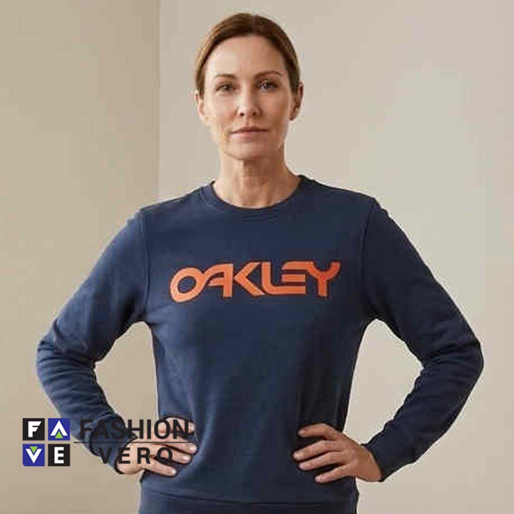 Oakley Classic Logo Navy Blue Sweatshirt 1 Oakley Classic Logo Navy Blue Sweatshirt featuring classic logo artwork, soft cotton fabric, navy blue styling, casual streetwear appeal, and versatile everyday fashion for relaxed outfits.
