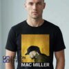 Vintage Mac Miller Yellow Backdrop Shirt featuring retro hip hop artwork, nostalgic rap music aesthetics, yellow backdrop design, vintage concert style, and casual cotton apparel.